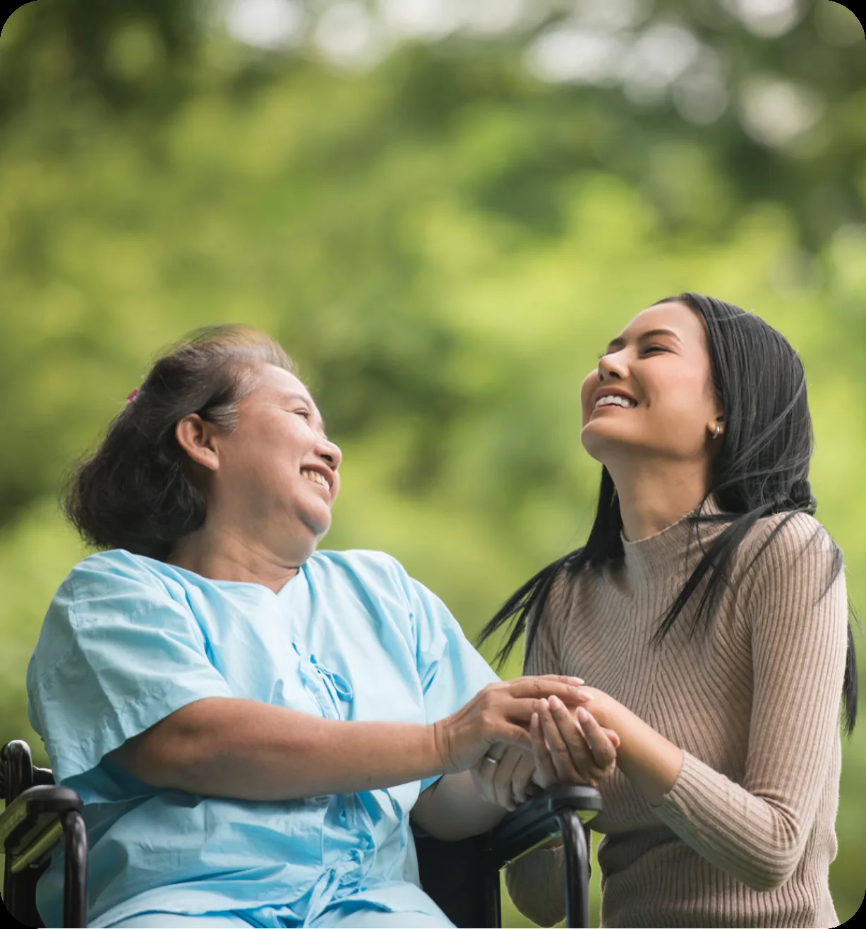 Caregiver and patient sharing a happy moment
